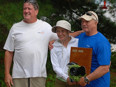 Sally Beck and crew accept the Milfoil Regatta 2014 trophy